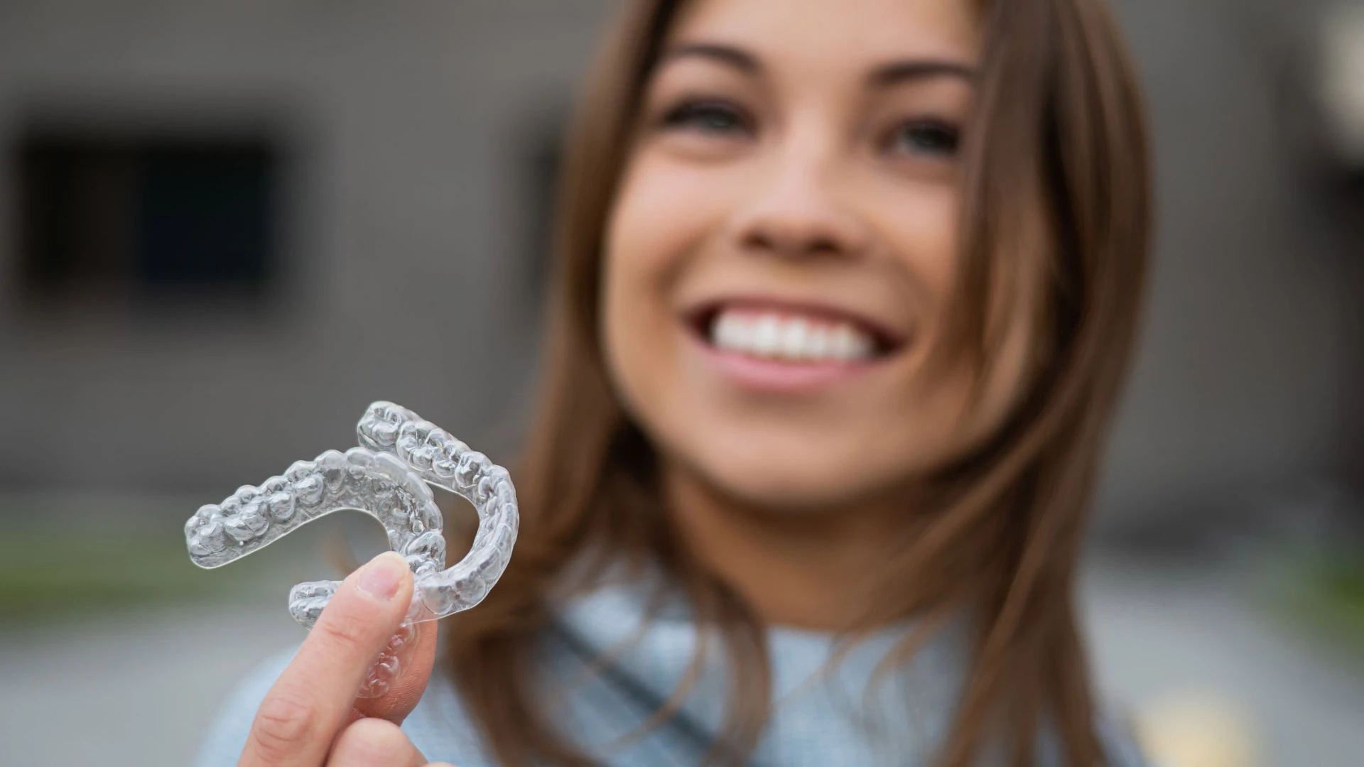 girl smiling with invisalign